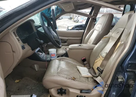 1999 Ford Explorer из США, поврежденный, VIN 1FMZU35P0XZB77099